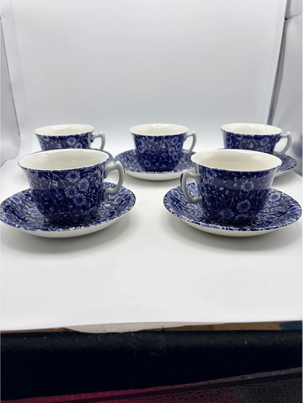 5 vintage sets of cups and saucers. Blue on white 1968 England.